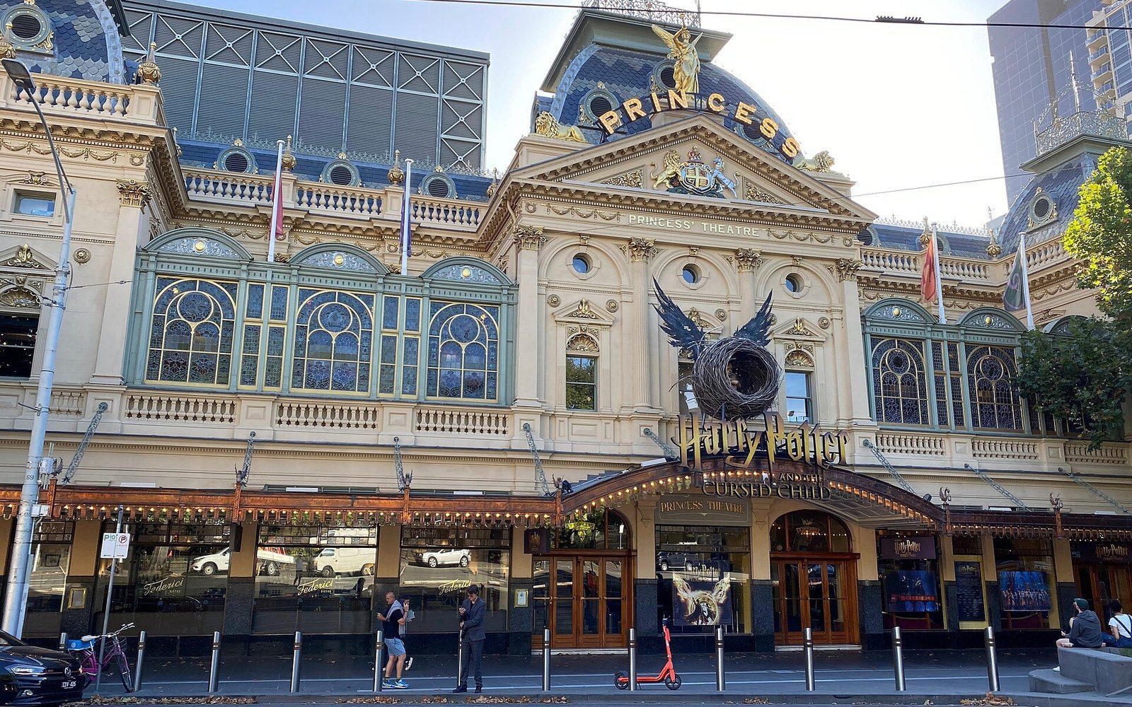 Ornate facade of the Princess Theatre with a giant nest and wings above the marquee